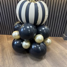 Striped pumpkin balloon stack